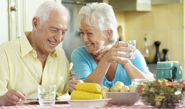 Homepage small ad with couple eating vegetables